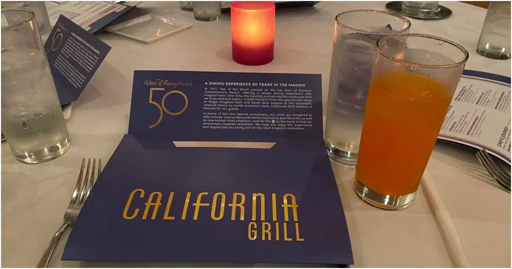 California Grill menu souvenir and Orange Soda located atop the Contemporary Resort