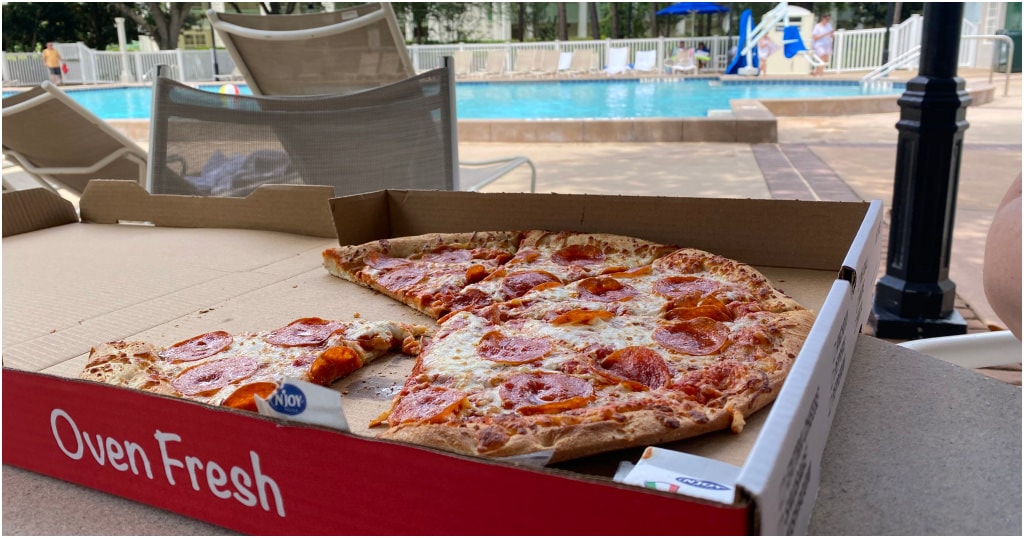 Having a rest day after hitting the parks is nice - here I am enjoying a pizza by the quiet pool at Riverside.