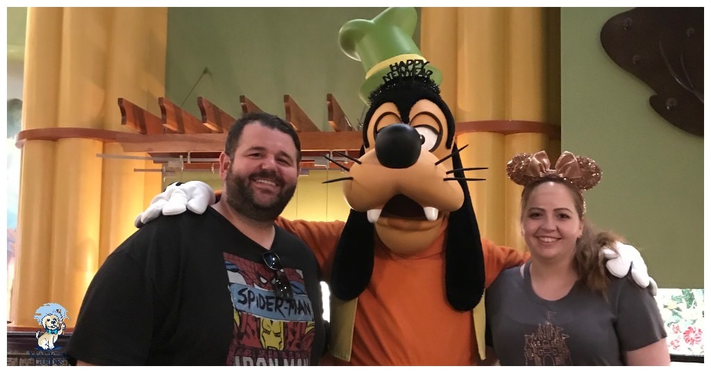 My husband and I meeting Goofy during breakfast at the Garden Grove at the Swan hotel.