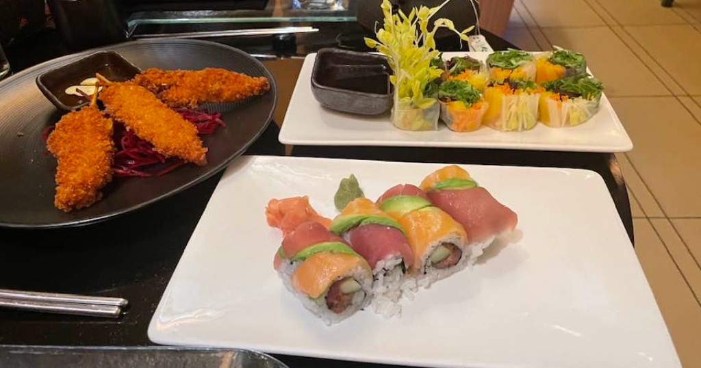 Tempura Shrimp, Kimono rolls featuring yellow tail, tuna, & salmon, and a Vegetarian Summer Roll.