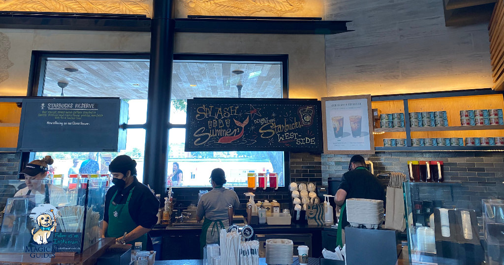 Inside the busy Starbucks West Side at Disney Springs.