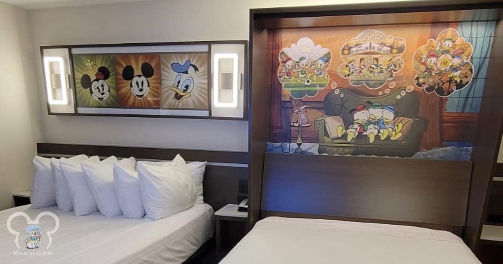 This standard room at All Stars Movies features two queen beds, one is a murphy bed that can be put up during the day for more room.