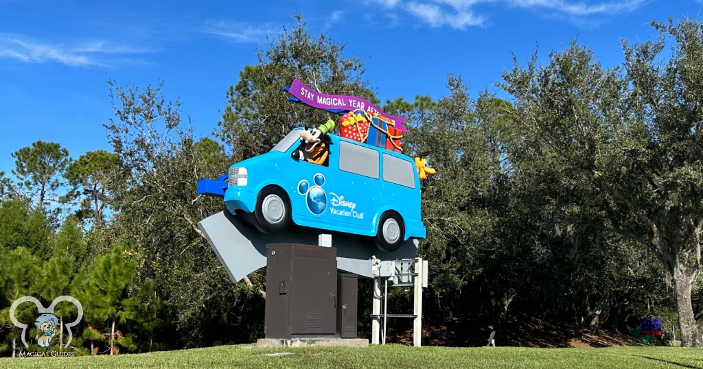 Goofy driving the van to the DVC sign across from the Bonnet Creek Resorts at Walt Disney World.