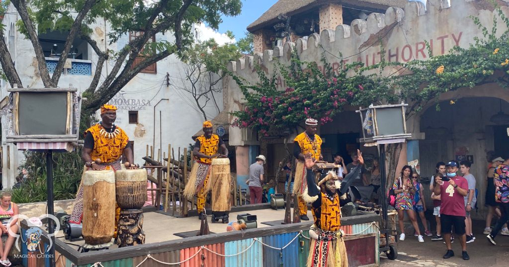 Drummers perform at Animal Kingdom. You can use the bathroom, and get refreshments in this same area.