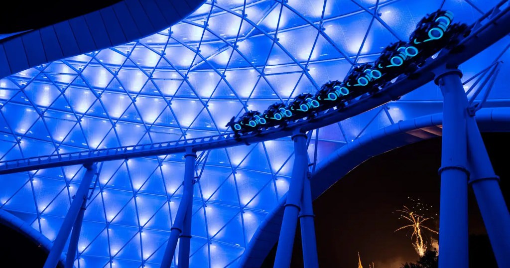 Tron Coaster being demo'ed at night with the lights on. (Photo by Disney)