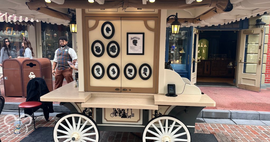 A silhouette portrait cart inside of Magic Kingdom right off Main Street U.S.A. waiting for their first customer of the day, me!