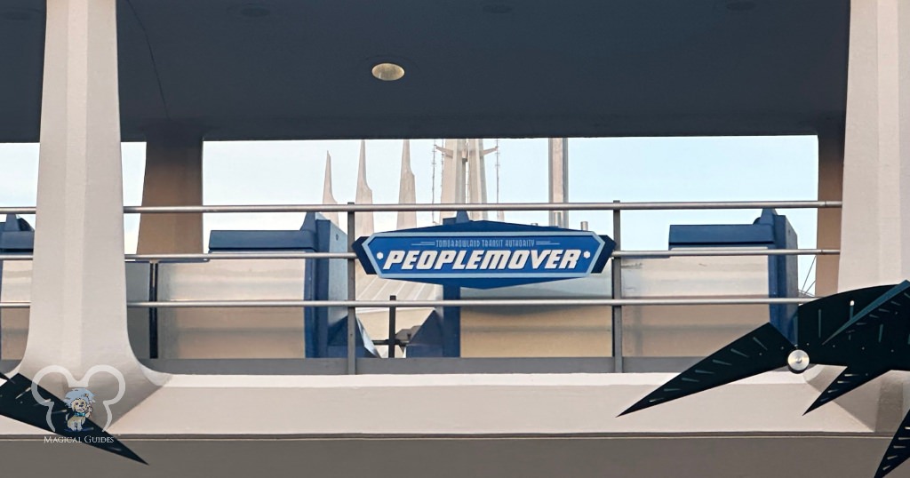 A view of the empty ride cars for the PeopleMover. You can see a little of Space Mountain in the background.