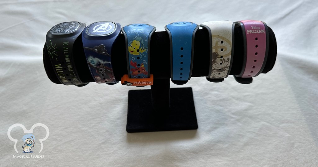 Magic Band Holder we use to display our Magic Bands. The two on the left are MagicBand+. The three in the middle are MagicBand 2. The last band on the right is the original MagicBand.