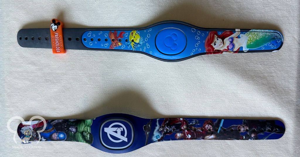 Top is an Ariel MagicBand2 from 3 years ago that still works. Bottom is my husband's Avengers MagicBand+.