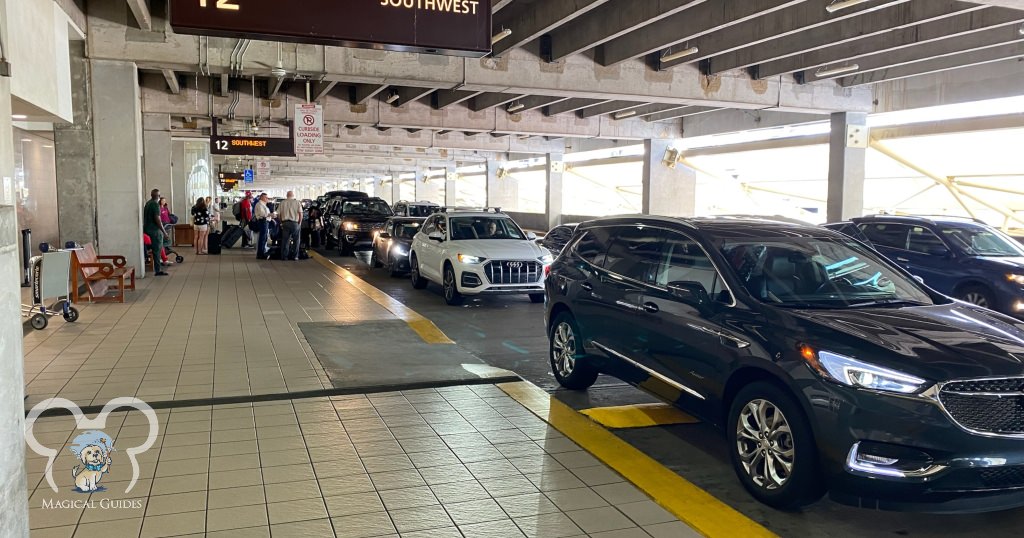 Cars waiting to pick up passengers at the MCO Airport. This is what the ride-share section looks like as well.