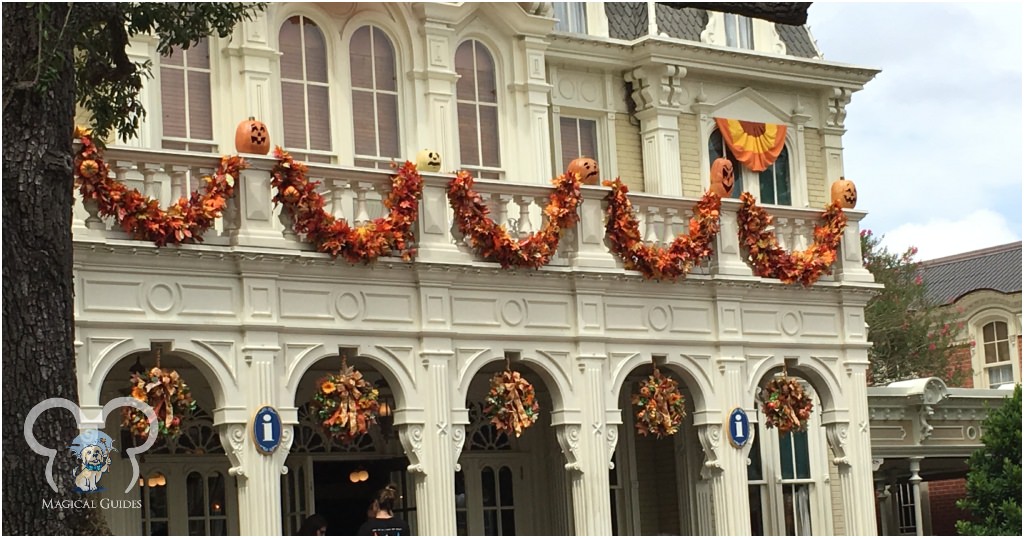 Fall decorations seen from the entrance of Magic Kingdom in October.