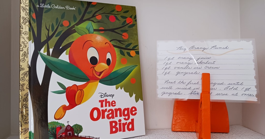 The Orange Bird a Little Golden Book on display next to an orange punch recipe.