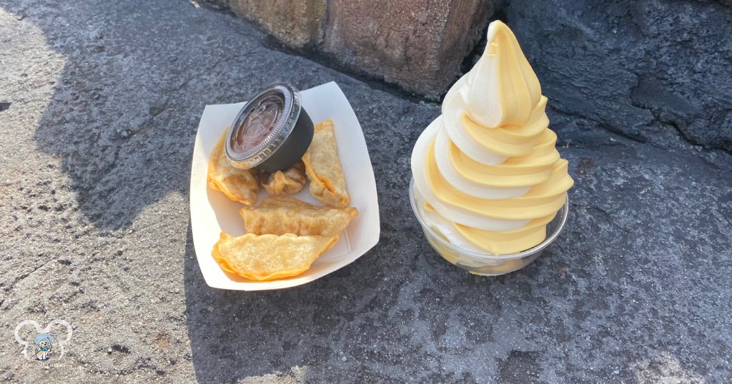 The pork pot stickers with the Orange Sesame Ginger Sauce with the perfect savory pairing with the cup of soft-serve ice cream from Sunshine Tree Terrace.