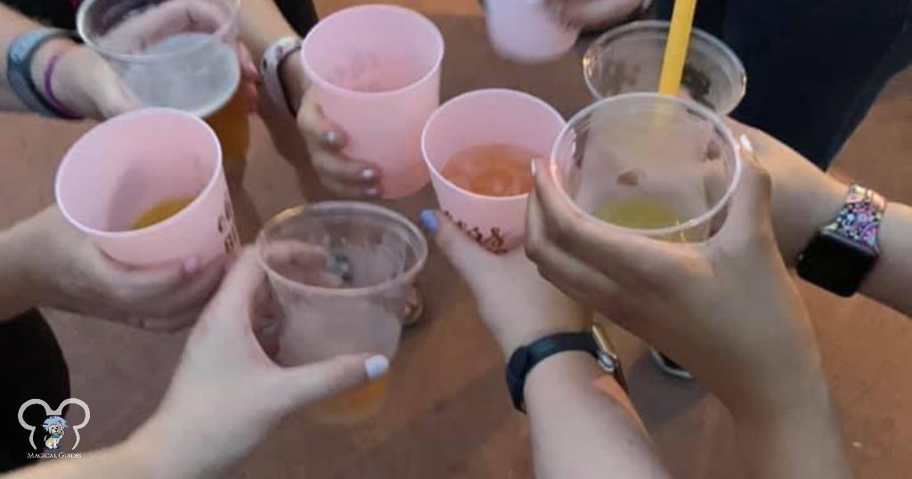 Sharing drinks with cups we brought in with us to EPCOT.