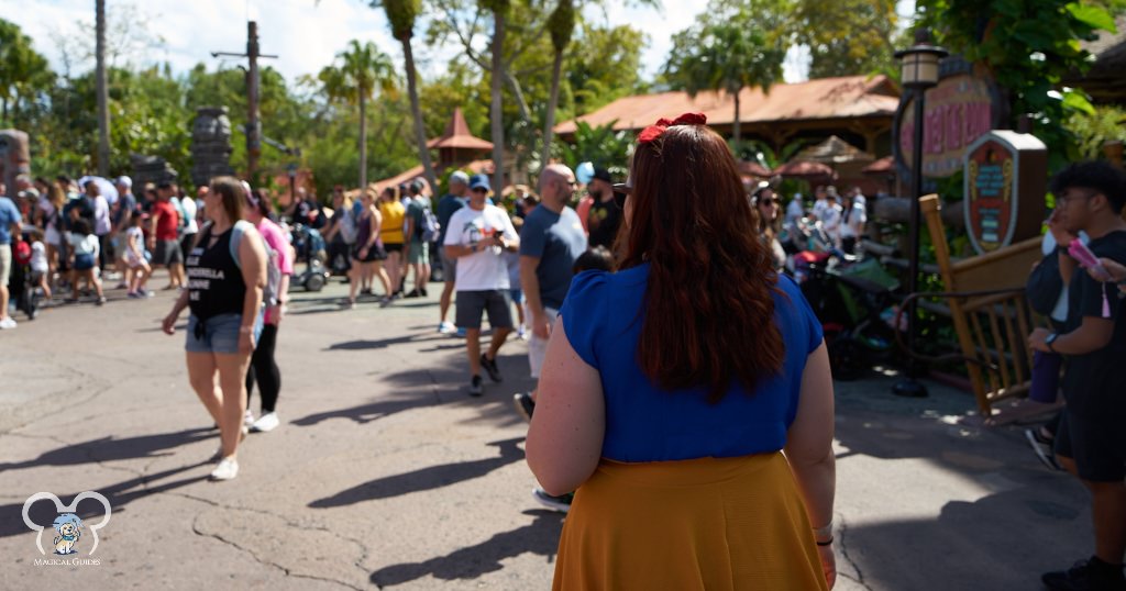 Disneybounding as Snow White, I walk through Adventureland inside Magic Kingdom to The Magic Carpets of Aladdin.