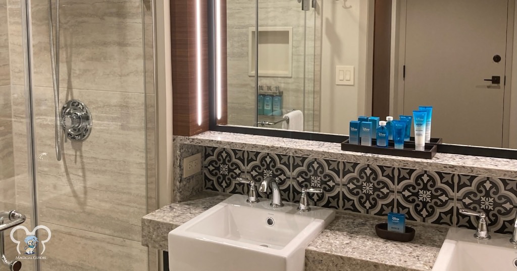 Moderate resorts feature dual vanities, walk in shower and I love the backsplash at Coronado Springs.