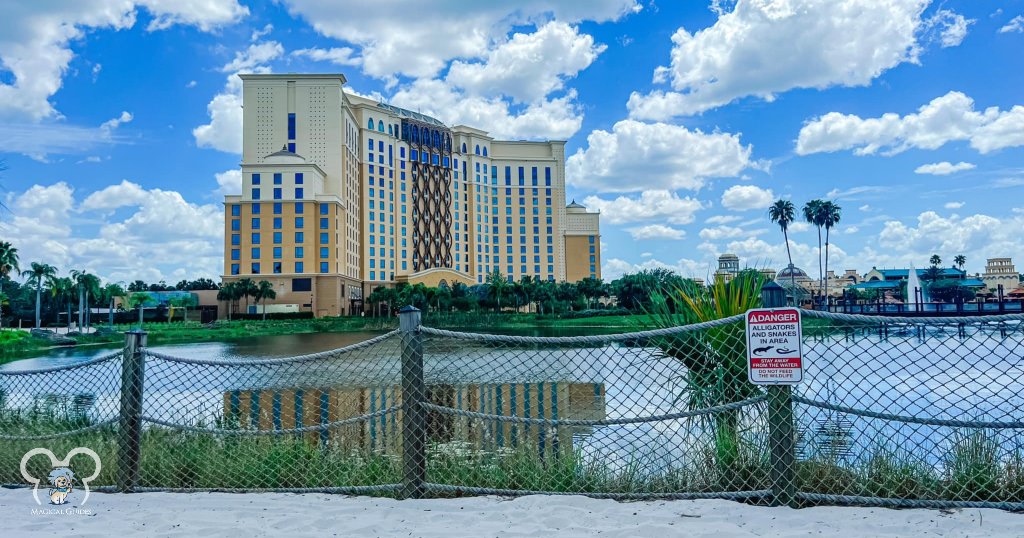 Take the view of the main building next to the Gran Destino Tower along the Lago Dorado lake.