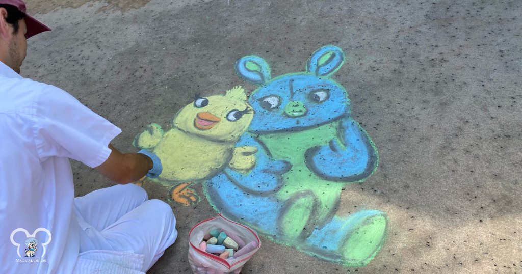 A cast member at Typhoon Lagoon working on some Easter chalk drawings. This was so cool to watch!