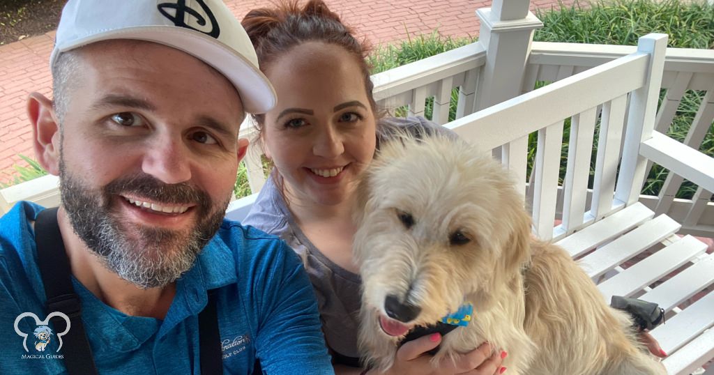 My husband Chris, our dog Walt, and I at Disney's Port Orleans. We stopped to take a break on a  bench during our afternoon walk.