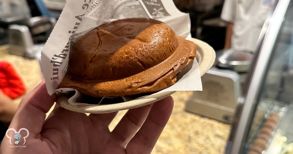 This iconic ice cream treats in EPCOT is a freshly baked brioche bun with your choice from a variety of ice cream topped with a sauce.