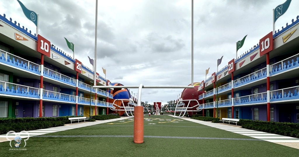 Disney's All Star Sports Resort field in front of the resort room buildings. Families were playing football out here.