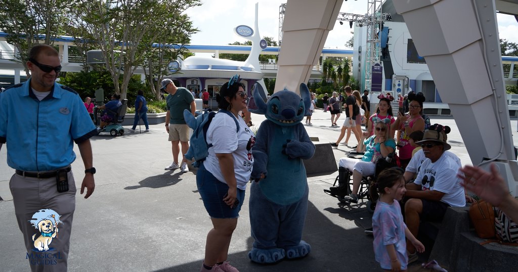 Stitch was out exploring Tomorrowland when he stumbled unto guests eager to snap a picture with him.